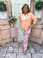 Stay chic and sun-safe in our Molly Wide Leg Pants in Tropical Haven print. With UPF50 fabric, side pockets, and a comfy stretch waistband, they’re perfect for summer.
