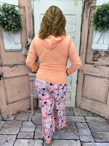 Stay chic and sun-safe in our Molly Wide Leg Pants in Tropical Haven print. With UPF50 fabric, side pockets, and a comfy stretch waistband, they’re perfect for summer.