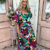 Experience the luxurious comfort & style of our Gentry Midi Dress! This dress boasts a square neckline, short balloon sleeves & a flounce hem.