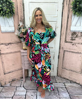 Experience the luxurious comfort & style of our Gentry Midi Dress! This dress boasts a square neckline, short balloon sleeves & a flounce hem.

