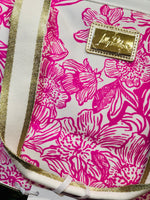 The secure zipper closure, gleaming gold accents, long handle straps, and adjustable crossbody strap make it simple to carry anywhere. Perfect for packing lunches, snacks, or chilled beverages, this cooler keeps your items cool while adding a bold pop of Lilly’s signature coastal charm.
