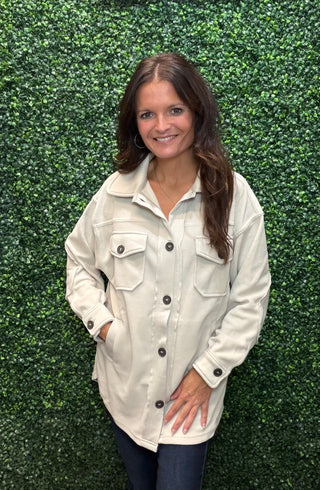 Fit | Oversized silhouette
Fabric | 100% Polyester fleece
Length | Approx. 28.5" (front), hi-low hem (measured from S)
Bust | Approx. 45" (measured from S)
Closure | Front button closure
Cuffs | Button cuffs
Detail | Elbow patches