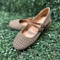 Featuring two sleek buckled straps across the foot, these stylish flats offer a secure fit and a touch of edge. The soft faux leather upper and lightly cushioned insole keep your feet comfy all day