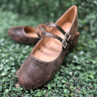 Featuring two sleek buckled straps across the foot, these stylish flats offer a secure fit and a touch of edge. The soft faux leather upper and lightly cushioned insole keep your feet comfy all day
