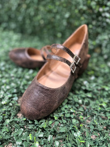 Featuring two sleek buckled straps across the foot, these stylish flats offer a secure fit and a touch of edge. The soft faux leather upper and lightly cushioned insole keep your feet comfy all day