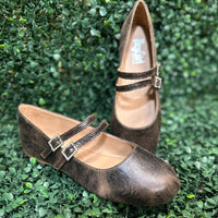 Featuring two sleek buckled straps across the foot, these stylish flats offer a secure fit and a touch of edge. The soft faux leather upper and lightly cushioned insole keep your feet comfy all day