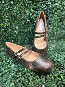 Featuring two sleek buckled straps across the foot, these stylish flats offer a secure fit and a touch of edge. The soft faux leather upper and lightly cushioned insole keep your feet comfy all day
