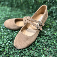 Featuring two sleek buckled straps across the foot, these stylish flats offer a secure fit and a touch of edge. The soft faux leather upper and lightly cushioned insole keep your feet comfy all day.