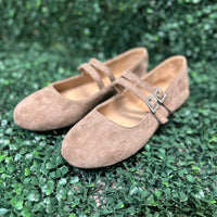 Featuring two sleek buckled straps across the foot, these stylish flats offer a secure fit and a touch of edge. The soft faux leather upper and lightly cushioned insole keep your feet comfy all day.