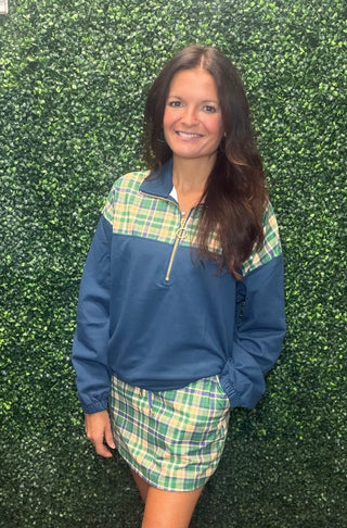 Mia Printed Pullover - Parker Plaid
Navy Blue Pullover with green plaid detail at the top 
Navy & Green Skort