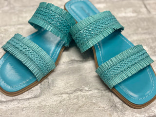 Empress Sandal - Turquoise
Step into spring and summer with ease in our Empress Sandals in Turquoise! These slide-on beauties feature a gorgeous double woven strap, adding the perfect touch of texture and fun to any outfit. 
Effortlessly stylish and oh-so-comfy, they’re a must-have for the sunny season!
Pierre Dumas Shoe 
Square toe shoe 
Flat sole 
woven strap detail