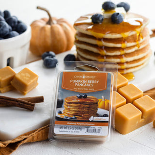 Pumpkin berry pancakes wax melt packaging with fudge and berries on a white surface