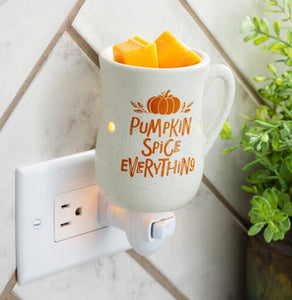Pumpkin Spice Pluggable Fragrance Warmer shaped like a cozy mug. Perfect for small spaces—flameless, festive scent with rotating plug base and bulb included.