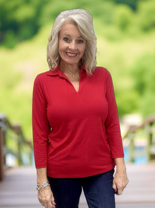 Shop the Lulu-B 3/4 Sleeve Collar Top. Breathable 92% nylon, 8% spandex with UPF 50+ sun protection and a polished fold over polo collar. True to size.