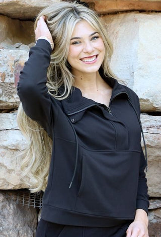 Color | Black
Fabric Feel | Soft, textured ribbed knit
Fabric Content | 81% polyester, 19% spandex
Neckline | Half zip
Finishing Detail | Shimmer detail