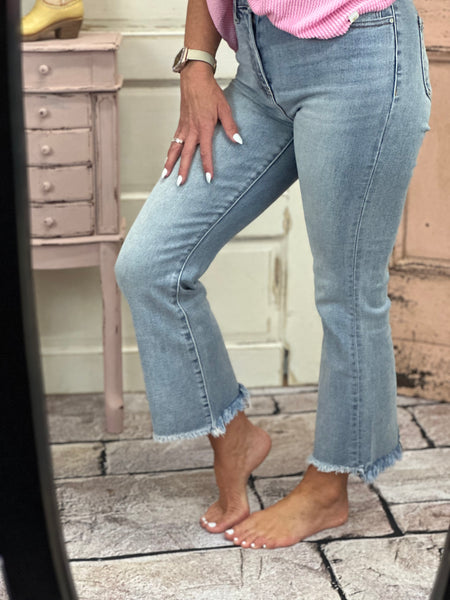 Elevate your style with our High-Rise Crop Flare Side Step Jeans. With an 11