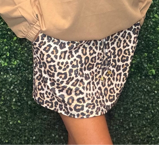 Fabric | 85% Polyester, 15% Spandex
Waistband | Stretchy with adjustable drawstring
Lining | Built-in shorts
Pockets | Yes
Print | Safari Chic leopard