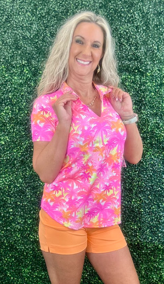Elevate your wardrobe with the Lulu B Short Sleeve V-Neck Top with Collar, featuring butter-soft, wrinkle-free fabric that offers both luxury and practicality. This top is designed with UPF 50+ sun protection, making it a must-have for sunny days and travel. The added collar gives it a polished, sophisticated look, while the lightweight, breathable fabric ensures all-day comfort. Ideal for both casual outings and more dressed-up moments, this top packs neatly without wrinkles, so you can always look put tog