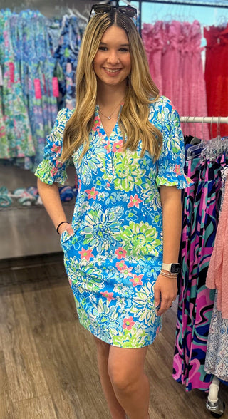 Feminine details meet warm-weather practicality in the Sienna Ruffle Sleeve Dress. The Blue Lagoon Blossoms print is fresh and vacation-ready, while the ruffle sleeve detail adds a soft, romantic touch to an otherwise effortless silhouette. Cooling UPF50+ fabric keeps you comfortable in the sun, and the lightweight, wrinkle-resistant construction means it looks just as good on day three of your trip as it did on day one.
