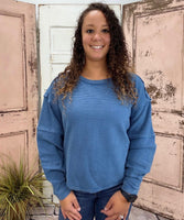 Simply Southern Amber Knit Top
Effortlessly chic and cozy, the Simply Southern Amber Knit Top is a must-have for everyday wear. Designed with an oversized silhouette, forward side seams, and a dropped hem for a flattering drape. Finished with a classic crew neckline and balloon sleeves with cuff detail for a soft, feminine touch.
