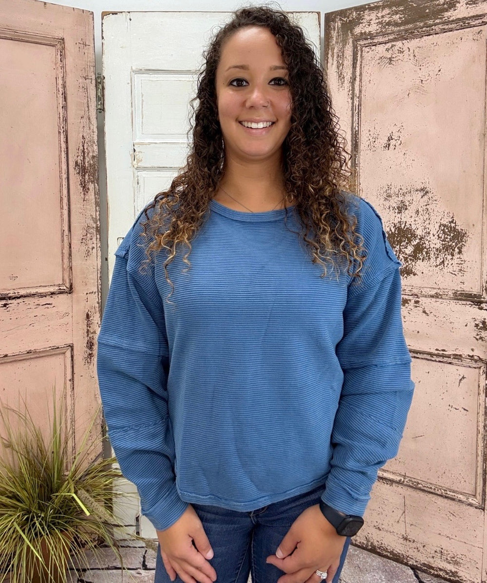 Simply Southern Amber Knit Top
Effortlessly chic and cozy, the Simply Southern Amber Knit Top is a must-have for everyday wear. Designed with an oversized silhouette, forward side seams, and a dropped hem for a flattering drape. Finished with a classic crew neckline and balloon sleeves with cuff detail for a soft, feminine touch.