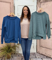 Simply Southern Amber Knit Top
Effortlessly chic and cozy, the Simply Southern Amber Knit Top is a must-have for everyday wear. Designed with an oversized silhouette, forward side seams, and a dropped hem for a flattering drape. Finished with a classic crew neckline and balloon sleeves with cuff detail for a soft, feminine touch.
