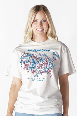 Front Pattern Tee 
Patriotic Tee
Simply Southern American Darlin white tee with USA map made of red and blue bows.