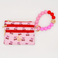 Simply Southern Bead Bangle Wallet – PU leather wallet with beaded bracelet strap, card slots, snap protector, and zipper coin pouch from Sweet Southern Charm
