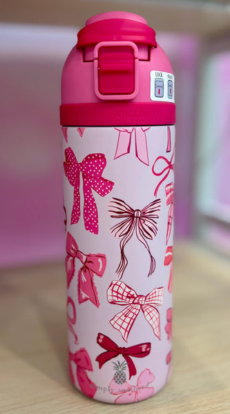 Pink water bottle with bow pattern