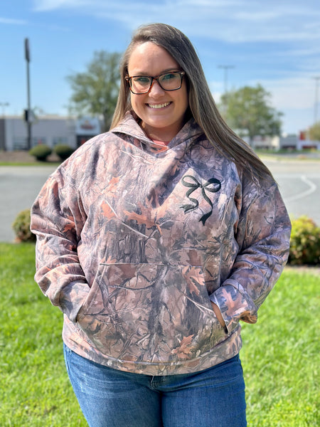 Simply Southern Camo Hoodie - Bow
Black glitter bow 
simply southern 
camo hoodie 
camo 
trendy