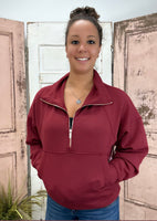 This half zip pullover features a crop fit, front kangaroo pocket, raglan sleeves, ribbed cuffs &amp; hem, large fold over collar with simply southern logo label. made of 48 modal, 48 polyester and 4 spandex.&nbsp;
