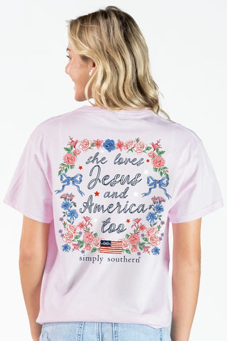Simply Southern peony pink tee with “She Loves Jesus and America Too” graphic.