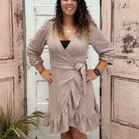 Step out in style with this chic knit wrap dress! Designed with a flattering wrap waist construction, playful flounce hem, and elegant balloon sleeves, it’s the perfect mix of classy and fun. The soft, stretchy knit blend (20% rayon, 75% polyester, 5% spandex) ensures comfort while keeping its shape, making it a go-to piece for everything from brunch to date night.