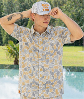 Simply Southern 
Simply Southern Mens 
The men's coastal button down features a variety of designs and colorways, a button front placket, collard neckline, chest patch pocket, short sleeves, regular fit and simply southern logo label.

Material Content: 94% Polyester &amp; 6% Spandex

