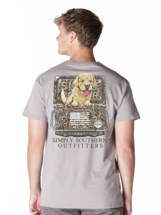 Simply Southern men’s driftwood tee with dog sitting in camo cooler graphic.