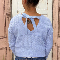 Simply Southern Open Back Bow Sweater
Sweet and stylish, the Simply Southern Open Back Bow Sweater is a chic twist on a cozy classic. Featuring a round neckline and a feminine low back cutout finished with bow detail, this sweater is perfect for dressing up denim or layering over leggings for a flirty yet comfy look.