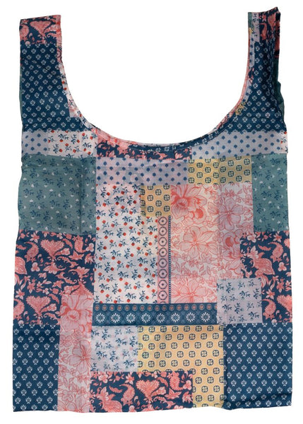Multicolored patterned tote bag on a white background