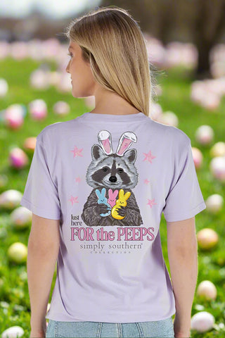 Simply Southern Tee 
Easter Tee
Short Sleeve Tee 
features a raccoon wearing bunny ears holding peeps. 
printed on a lilac tee