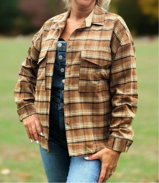 Simply Southern Plaid Shacket

This plaid shacket features a button down front closure, two chest pockets, corduroy neck trim and a PU leather Simply Southern label on the bottom hem,

Material Content: 50% Cotton &amp; 50% Polyester