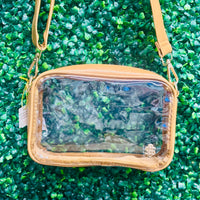 Simply Southern Stadium Crossbody - Coco
The Simply Southern Stadium Crossbody is perfect for game day, concerts, or nights out. Clear PU body, gold hardware, zip closure, and detachable strap.