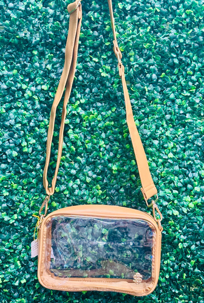 Simply Southern Stadium Crossbody - Coco
The Simply Southern Stadium Crossbody is perfect for game day, concerts, or nights out. Clear PU body, gold hardware, zip closure, and detachable strap.