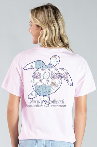 Simply Southern Tee 
Turtle Tee 
Tracking Turtle Tee 
Short Sleeve Peony Tee Shirt with a Sea Turtle graphic with a patchwork design color on the turtle