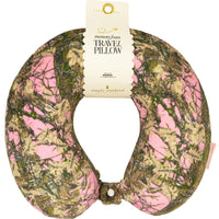Travel pillow with pink and green camouflage pattern on a white background