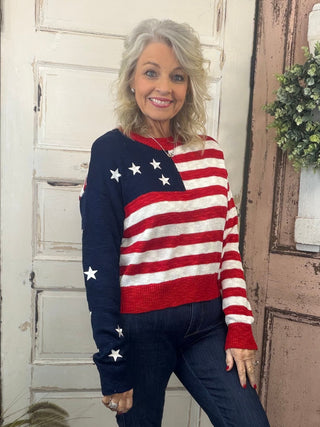 Simply Southern USA sweater with striped body and embroidered star details on sleeves, women’s relaxed-fit patriotic knit sweater.