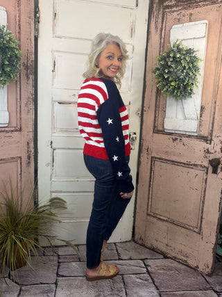 Simply Southern USA sweater with striped body and embroidered star details on sleeves, women’s relaxed-fit patriotic knit sweater.