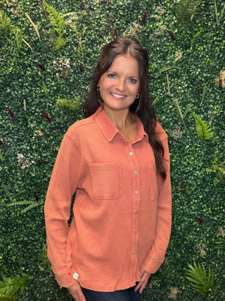 Fit | Relaxed fit
Fabric | Soft textured waffle knit
Fiber Content | 60% cotton, 40% polyester
Design | Full button front, cuffed long sleeves, and chest pockets