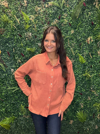 Fit | Relaxed fit
Fabric | Soft textured waffle knit
Fiber Content | 60% cotton, 40% polyester
Design | Full button front, cuffed long sleeves, and chest pockets