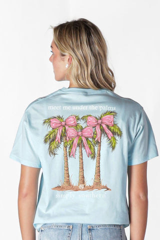 Simply Southern glacier blue tee with “Meet Me Under the Palms” graphic featuring palm trees with Pink bows.