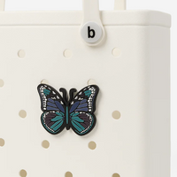 We believe in bags that are as joyful as they are useful, which is why we've created a collection of decorative accents to add pop and personality to your tote. Think of Bits as our version of a statement patch that you can easily snap into the holes, then update as often as you'd like to match your mood or the moment.

Dimensions: 3in DIA
Material: Silicone; Weight: 0.6oz