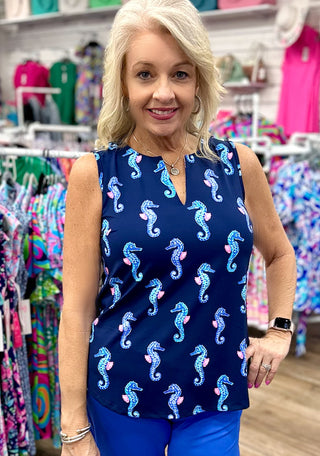 The Sleeveless Keyhole Top in the Seahorse print features a V-style neckline with a delicate keyhole detail — that whimsical, ocean-inspired print brings a fun, feminine energy to a clean, streamlined silhouette that pairs beautifully with solids and neutrals alike.
